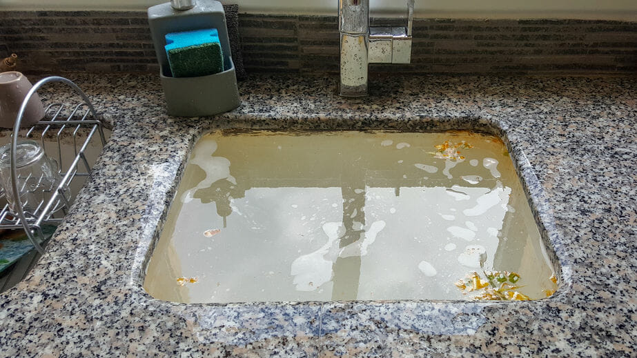 kitchen sink backed up on both sides