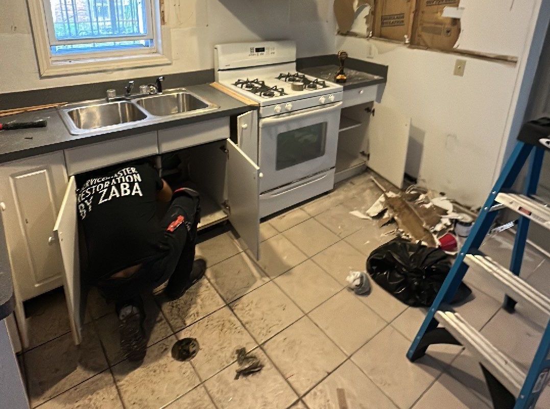 overflowing kitchen sink