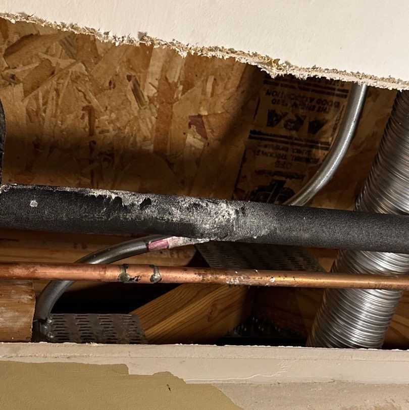 signs of busted water pipe