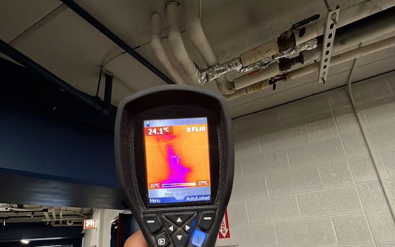 a burst water pipe in a garage