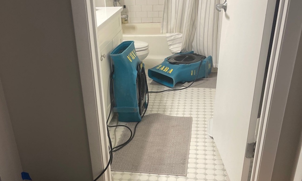 what causes a shower leak through ceiling chicago