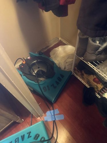 closet drying after burst pipe in des plaines apartment