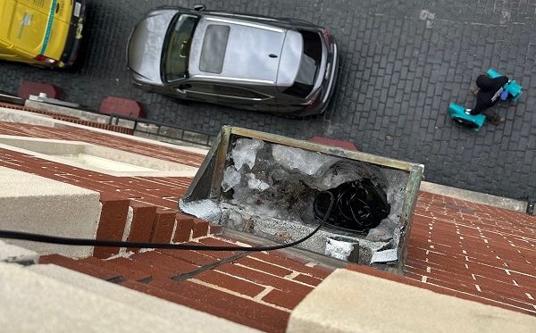 rooftop patio leak in chicago due to clogged drain
