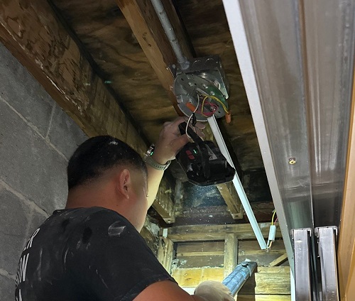 water damage restoration after rooftop patio leak